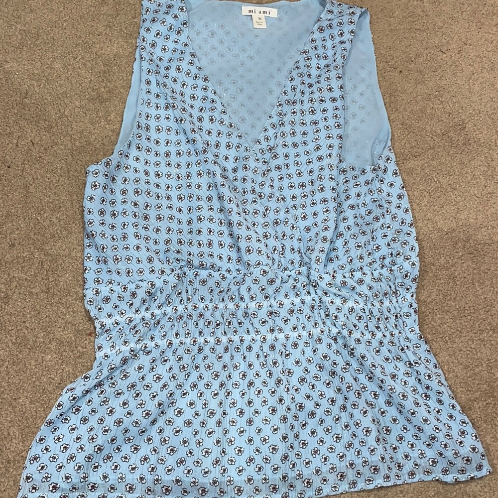 Blue floral tank top from Francesca’s